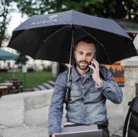 Stay Dry with Wearable Hands-Free Umbrella for Rain & Sun