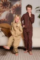 Knuffle | Ultimate Comfort in Huggable Onesies, Blankets & Apparel