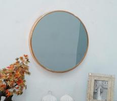 Shimmering Round Metal Wall Mirror in Rose Gold